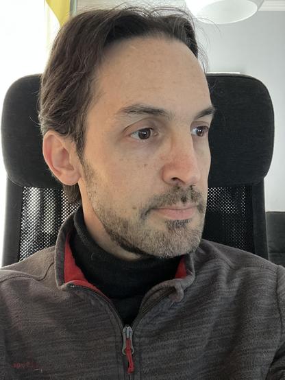 Selfie showing the left side of my face. My beard is mostly nearly trimmed. I still need a haircut, but that’s for another day