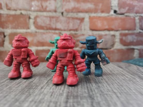 An assortment of small rubber robots