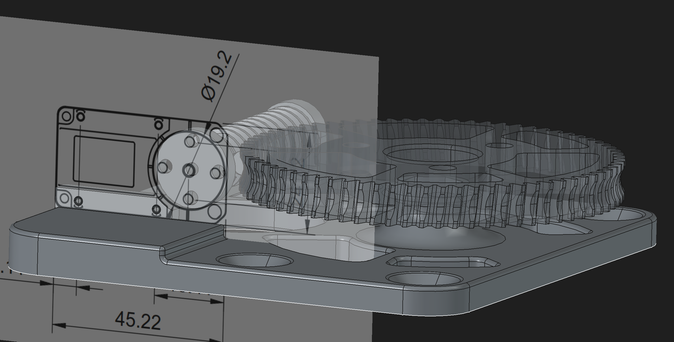 freecad screenshot of a large wheel, plate and a transparent drawing of a servo used for measurements