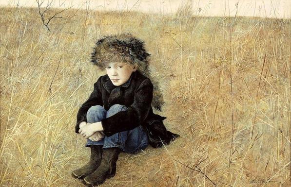 A young boy sits in a field of tall, dry grasses, wearing a dark coat and a fur hat. He appears contemplative, with his knees drawn to his chest. The background features a sparse tree and a muted sky, creating a somber mood.
