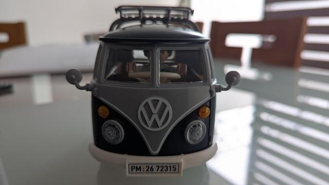 The VW bus from the front. You can see a Playmobil dude on the driver's seat through the windshield.
