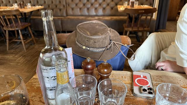 Hat on seat in pub