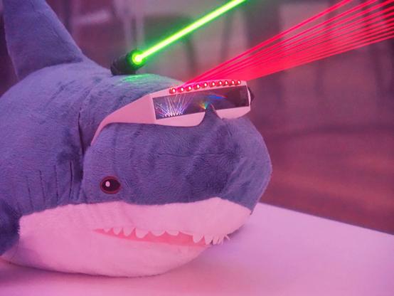 Blahaj with a freakin laser beam on his head