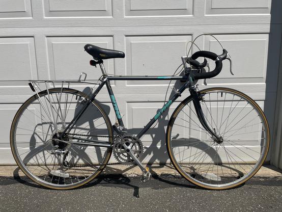 1987 miyata 215ST bicycle. to folks who don’t care about bikes: it’s an old road bike! to the folks who care about bikes: it’s a vintage touring bike, lugged steel, with a triple crank, cantilever brakes, and the original rack. very capable touring machine, not quite as full-featured as some of miyata’s high end offerings, but it’s got it where it counts so to speak.