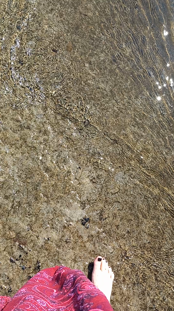 Mina fötter går i havet