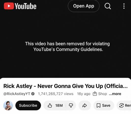 rick astley's never gonna give you up showing the video has been removed for violating YouTube's Community Guidelines.
