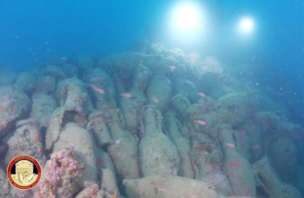 A underwater photo depicting amphorae