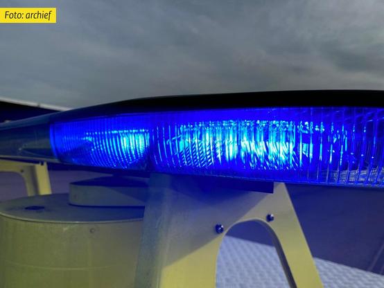 Archieffoto van blauw licht bovenop de wagen van een weginspecteur