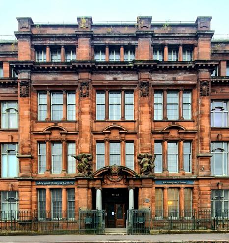 A classical style red sandstone Edwardian industrial building in the Springburn area of Glasgow.