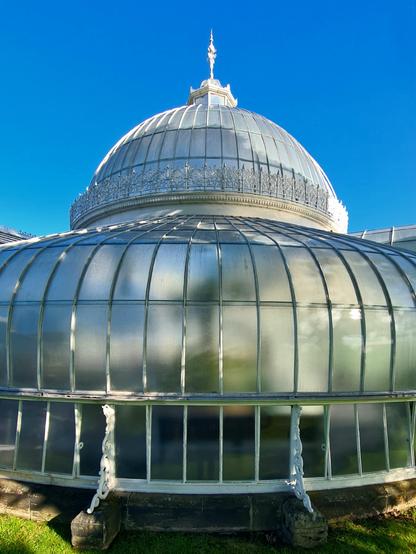 A large Victorian glasshouse in the Botanic Gardens in Glasgow.
