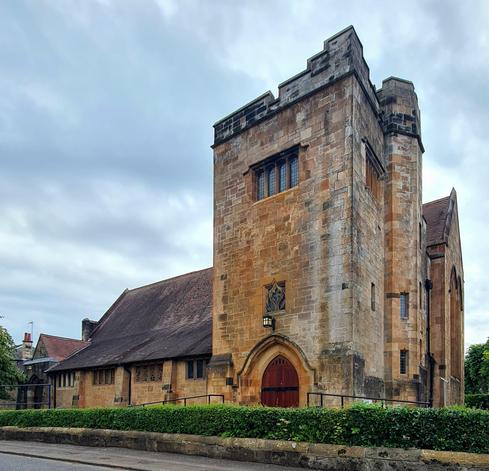 A large an imposing gothic revival style Victorian church.