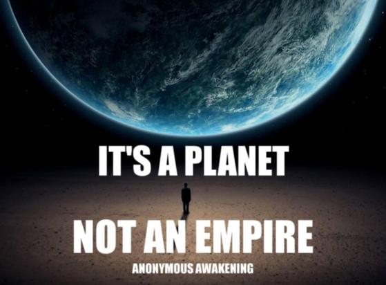 Text in artwork: “IT'S A PLANET NOT AN EMPIRE ANONYMOUS AWAKENING”