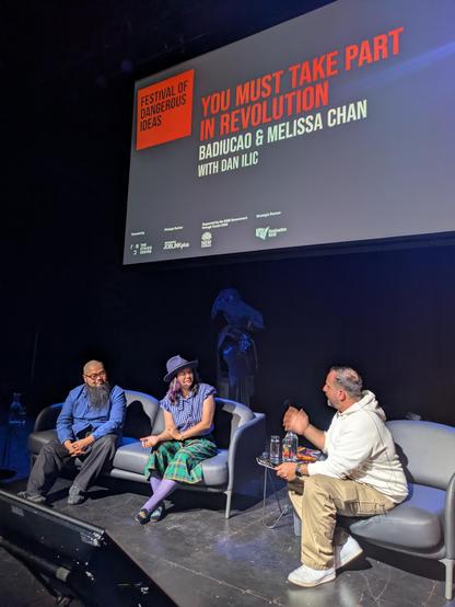 Badiucao and Melissa Chan with Dan Ilic at the Festival of Dangerous Ideas in Sydney