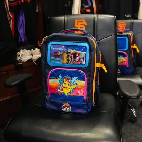 The Pokemon Worlds backpack on a chair in the SFGiants clubhouse