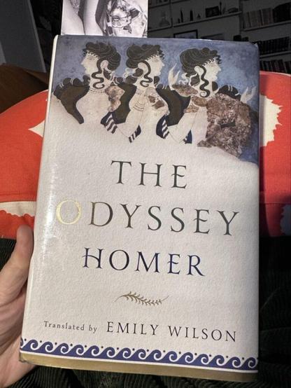A hardcover book titled The Odyssey by Emily Wilson