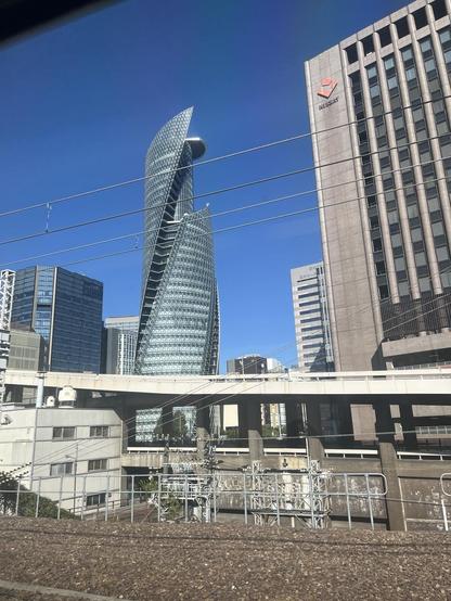 modern office tower with spiral cut around the façade