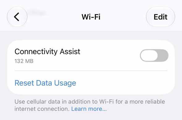 A screenshot of the iOS Wi-Fi settings showing the "Connectivity Assist" feature, with a data usage of 132 MB.