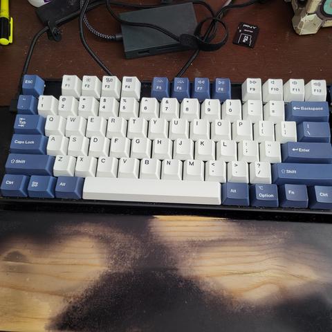 screenshot of a keyboard with bright white/blue PBT keycaps