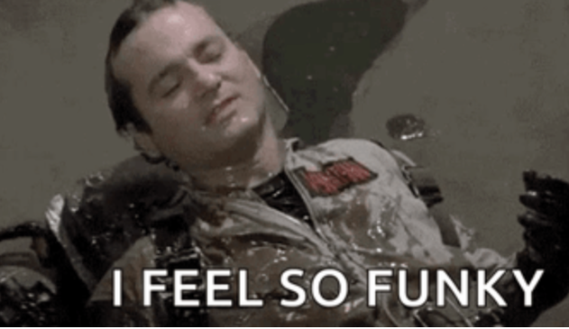 A screenshot from Ghostbusters. Peter Venkman lays on the floor covered in ectoplasm. The caption reads "I feel so funky"