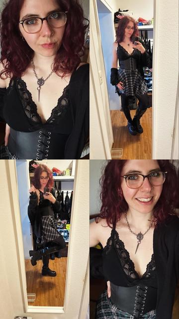 A person with curly red hair is dressed in a black lace top, a corset, and a plaid skirt. Accessories include a necklace and knee-high boots. The image features multiple angles, showing a playful pose and outfit details, with a cluttered background.