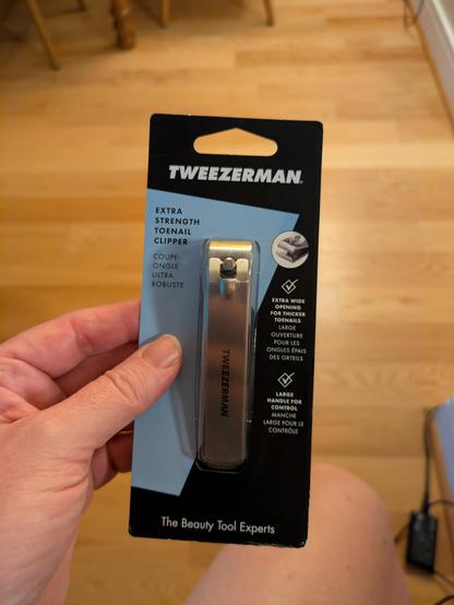 Metal toenail clippers in a package. Brand name: TWEEZERMAN