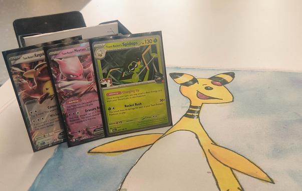 Team Rocket's Spidops, Mewtwo ex and Kangaskhan ex cards.
