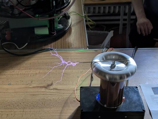 Tesla coils spitting fire.