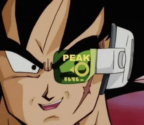 Goku wearing a scouter and laughing eerily, the scouter says "PEAK"