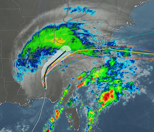A weather forecast map shows a large storm system moving across the eastern United States. A wide band of precipitation, indicated by green, yellow, and red colors, stretches from the Mid-Atlantic coast inland towards the Midwest. Several colored spaghetti model lines converge, tracing a general path from the Atlantic Ocean toward the US East Coast. A shaded grey corridor highlights a projected path, and a solid black line with numerical markers, including the number 24, tracks along this corridor, ending at a red dot over the southeastern region. The map displays the borders of various US states along the east coast and inland.