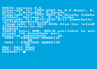 A blue screen with white text showing Fuzix booting on an emulated Atari 130XE to the "bootdev:" prompt.