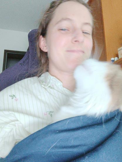 Arien chilling in the sling I got her and deciding to give me a kiss since my face is in range.