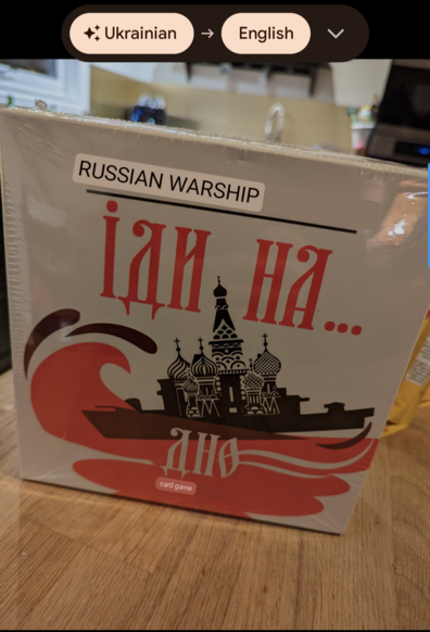 Same picture as previous, with overlays from Google Translate: "Russian warship — untranslated — card game"