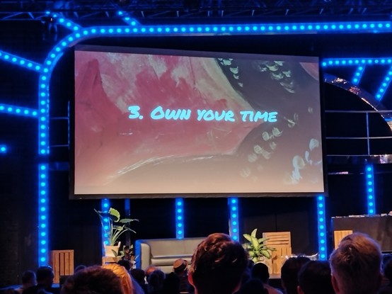 A slide saying "Own your time"