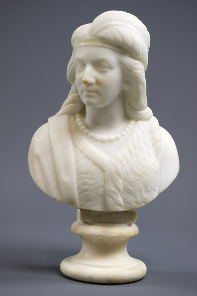 A small marble bust by Edmonia Lewis titled "Minnehaha," which pictures the love interest from Henry Wadsworth Longfellow's poem "The Song of Hiawatha"