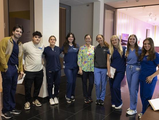 A group photo of students from the University of Georgia veterinary medicine program at the Georgia Museum of Art