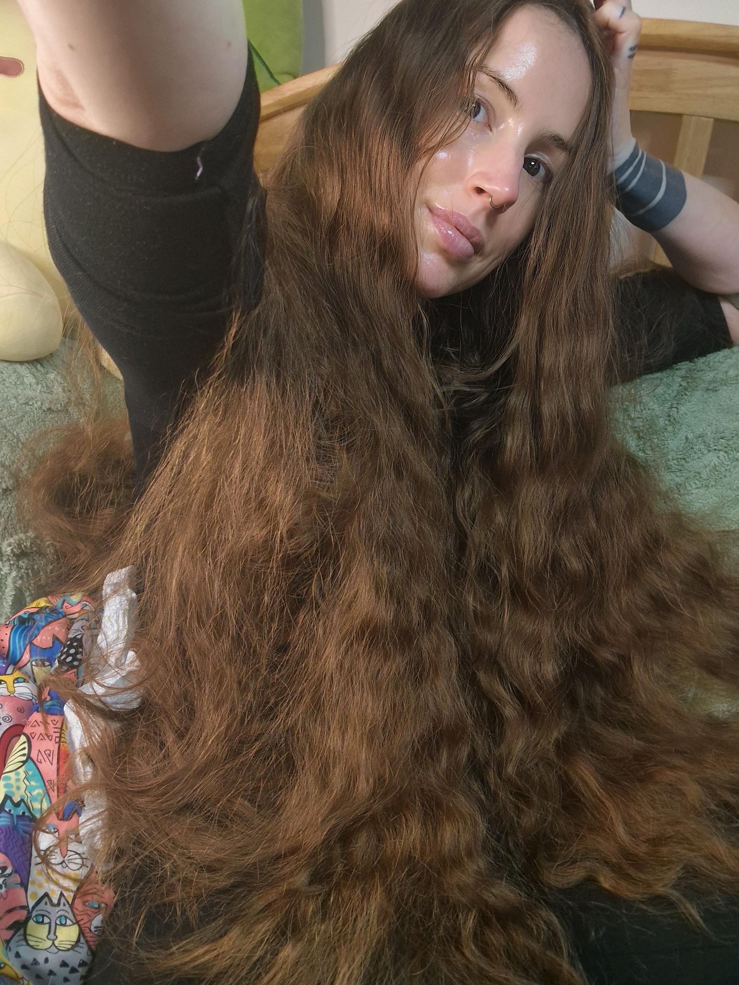 Selfie of me. My hair is down, and with it being over a metre long and a lot of it, it takes up most of the picture