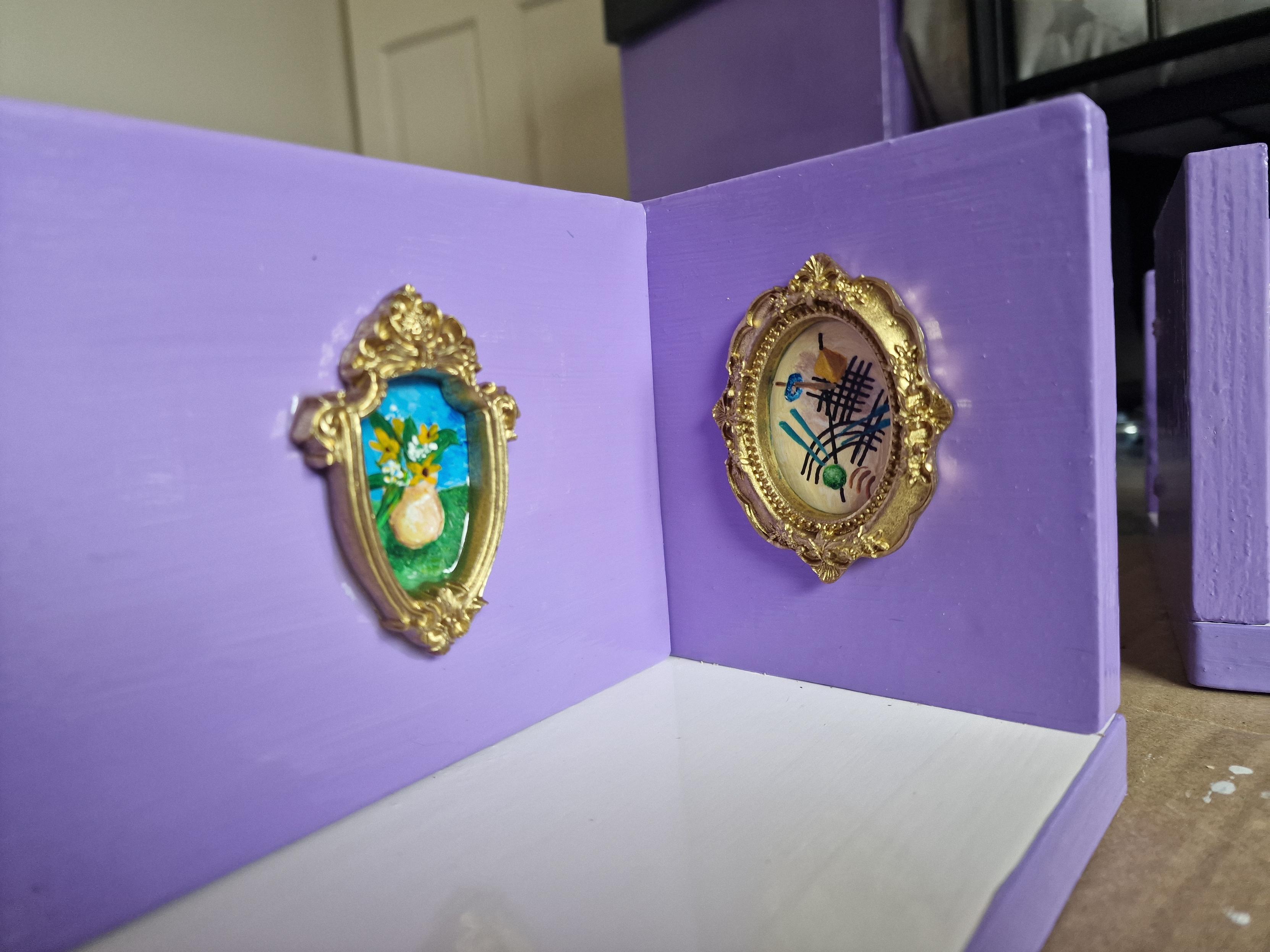 Two more tiny paintings on the wall of the maze