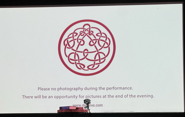 “Please no photography during the performance.”
