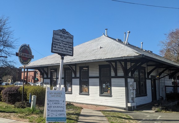 former train depot with historical marker