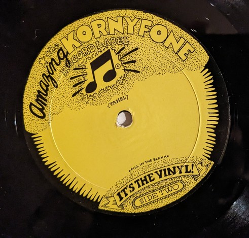 yellow Amazing Kornyfone LP inset sticker, fill in the blank