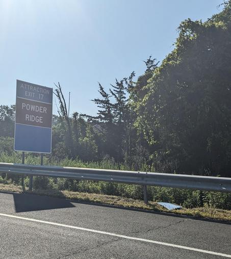 road sign reads powder ridge