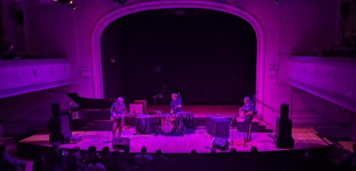 Lee Ranaldo on guitar, Brian Chase on drums, David Watson on bagpipes