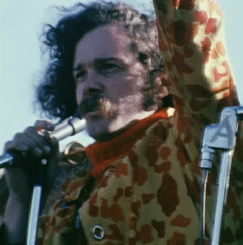 Ed Sanders at microphone