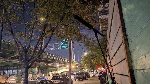 a microphone pointed at the BQE