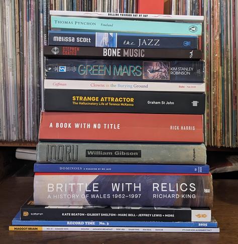 Rolling Thunder Day By Day
Thomas Pynchon, Vineland
Melissa Scott, The Jazz
Stephen Coates, Bone Music
Kim Stanley Robinson, Green Mars
Christopher Coffman, Clowns In the Burying Ground 
Graham St John, Strange Attractor 
Rick Harris, A Book With No Title
William Gibson, Idoru
We Jazz #10
Richard King, Brittle With Relics
Comics Journal #311
Record Time #3
Maggot Brain #21