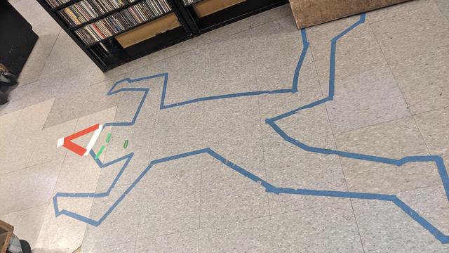 blue victim outline with red santa hat