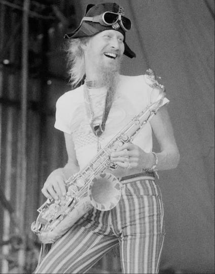 Nik Turner in Ice Cream Kid shirt with saxophone