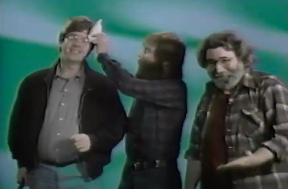 Phil Lesh, Brent Mydland (mopping Lesh's brow), Jerry Garcia coming atcha from your teevee