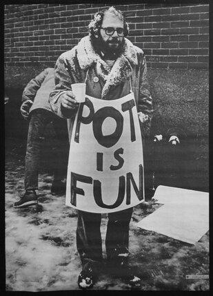 Allen Ginsberg in POT IS FUN sign