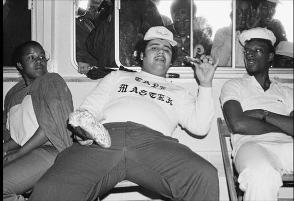 man in t shirt that reads Tape Master